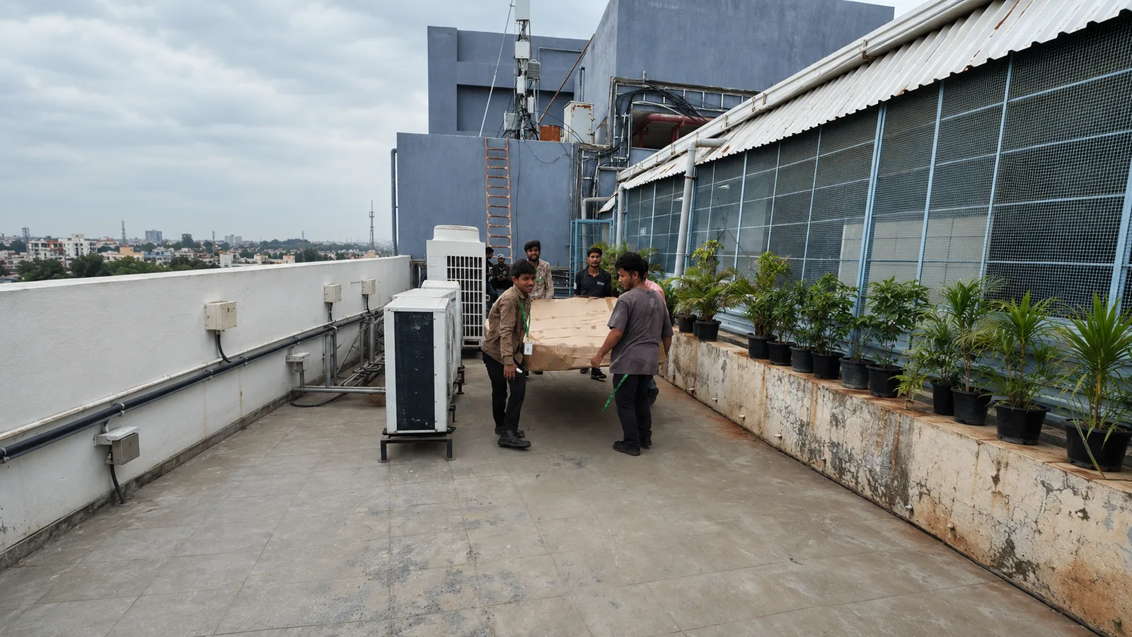 Installation team fitting signage on site